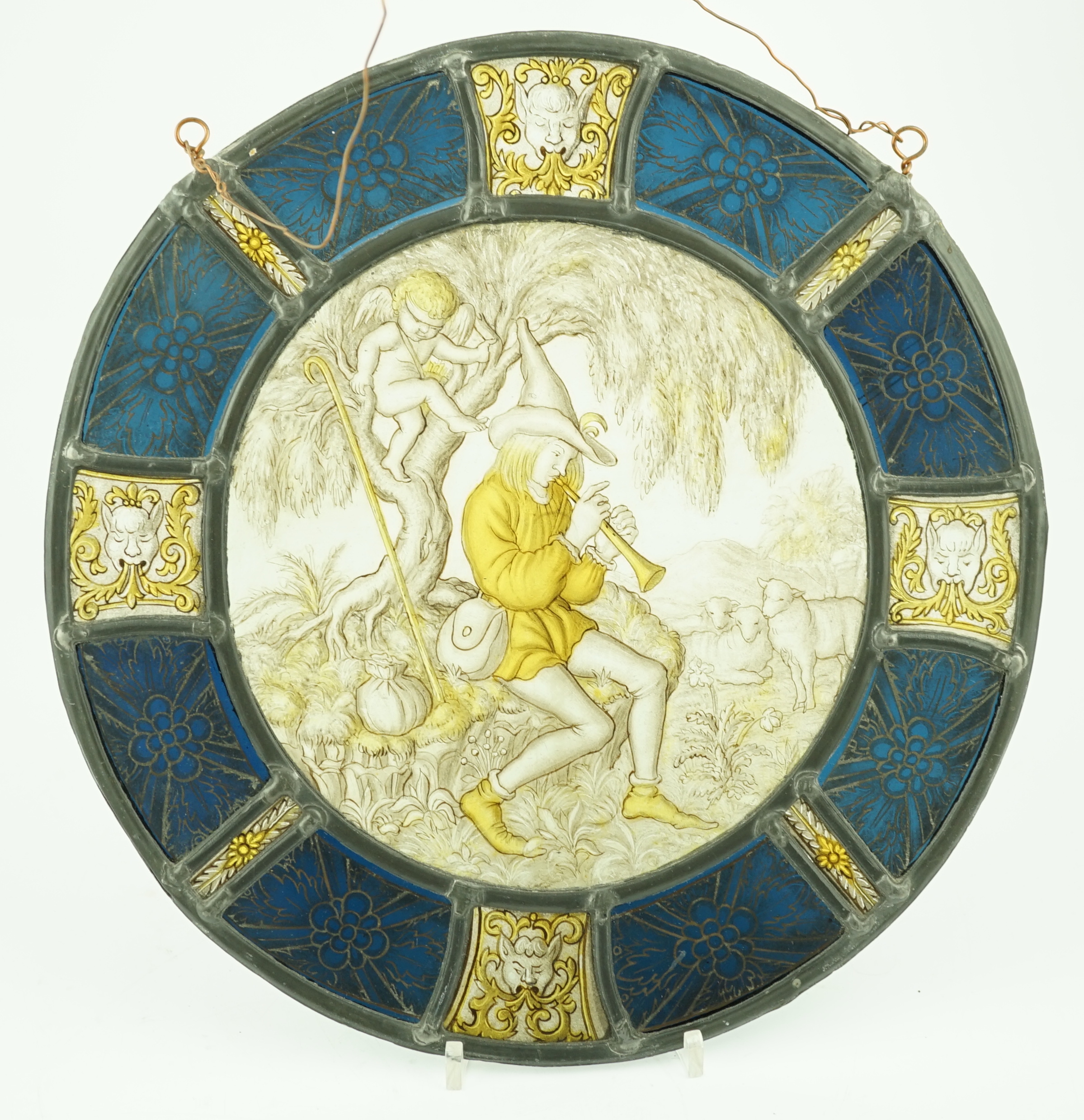 An 18th century Flemish stained glass panel, 32cm diameter